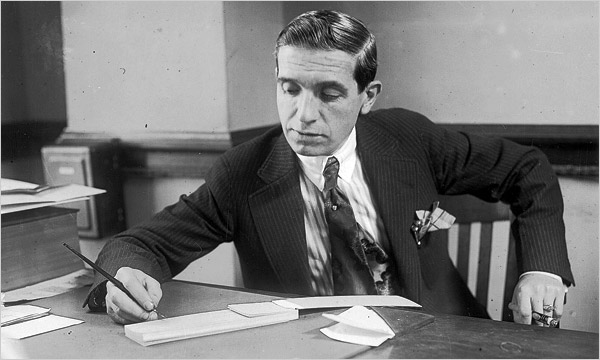 Ponzi in 1920, while still working as a businessman in his office in Boston